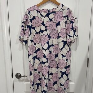 Ann Taylor floral print  pink & navy dress featuring short sleeves bow details.